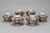 Antique Japanese Imari porcelain bowls with lids, set of 6. Each with alternating panels showing a hand painted floral,...