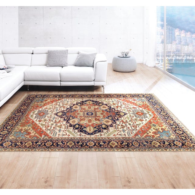 The Serapi Collection reinterprets traditional tribal geometric design through a refined palette. Each rug is hand-knotted...