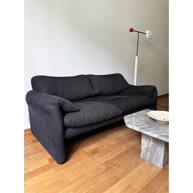 Italian Black Two-Seater Loveseat Sofa by Vico Magistretti for Cassina, 1980s, in Very Good conditions. Designed 1970 to...