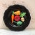 French Majolica vegetable wall platter Vallauris, circa 1950. On a black background it's a trompe l'oeil platter with...