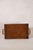 Vintage English oak serving tray with integrated handles, brass corner accents, and a rich aged finish. A functional piece...