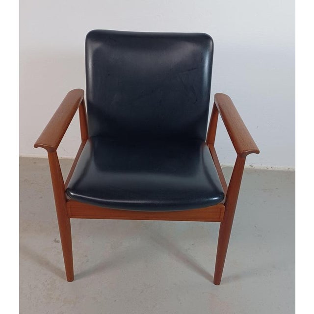 Finn Juhl set of two fully restored armchairs including custom upholstery The chairs were designed in 1963 for France and...