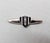 1980s Art Deco style rhodium plated U of black enamel with two clear baguette rhinestones in the center with a line of...