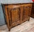 Louis xv style fruitwood sideboard with antique 18th-century elements two molded doors scalloped top curved crossbar...