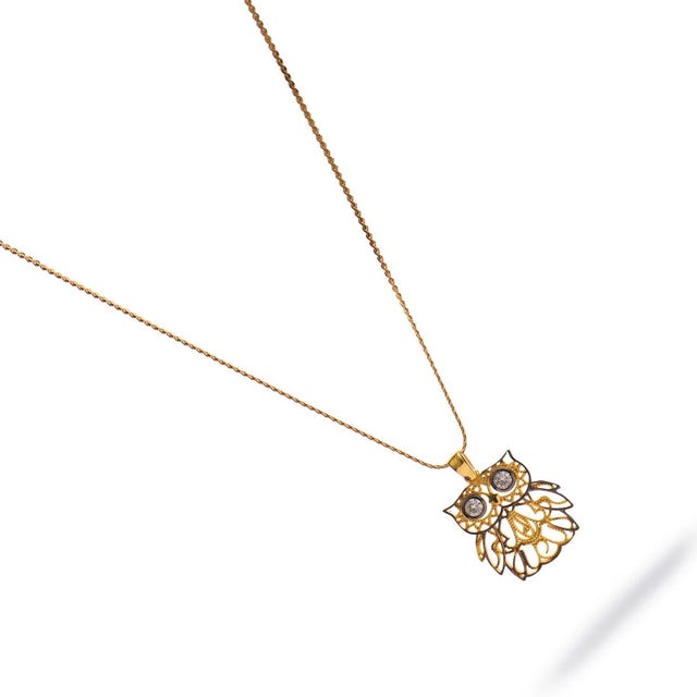 Embrace the timeless symbol of wisdom and intuition with the Wisdom Owl Diamond Eyes Gold Necklace. Handcrafted in...