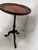 Round Louis XVI style side table in natural wood Tripod base with turned central column Round top with red leather...