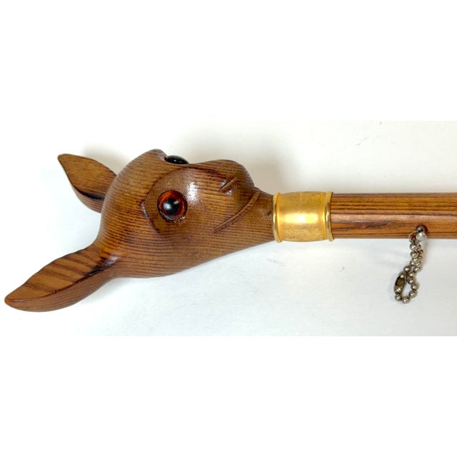German Black Forest Style Carved Deer Head Baton with Brass Mounts, Circa 1930s A whimsical and finely executed carved...