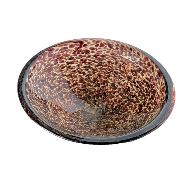 Vintage tortoise shell style Murano glass dish. Dish has dense infused brown and translucent amber irregular organic...
