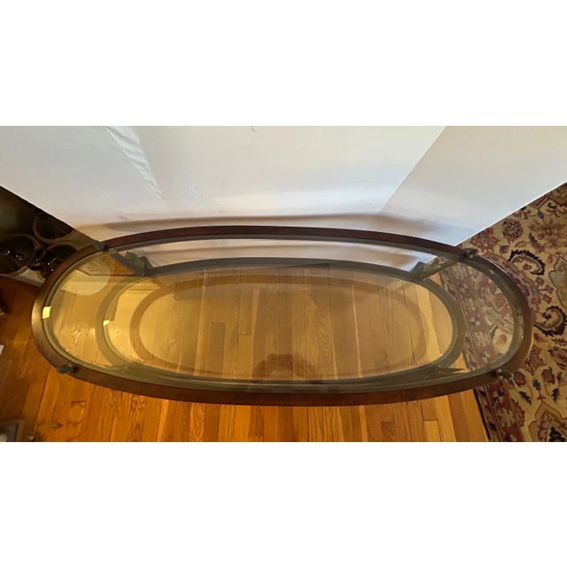 Our elegant and functional two tier coffee table will make your room complete. This piece features beveled glass on each...