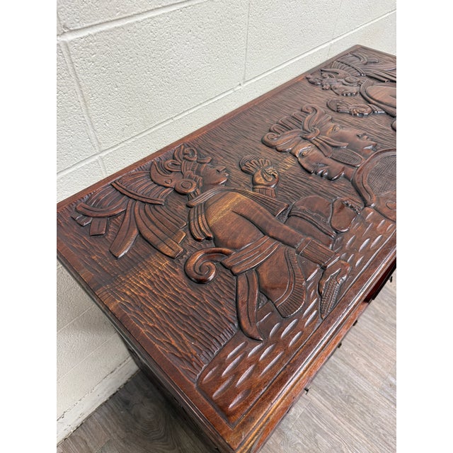 This is a vintage hand-carved Mexican Colonial server or credenza crafted from solid wood and decorated with exceptional...