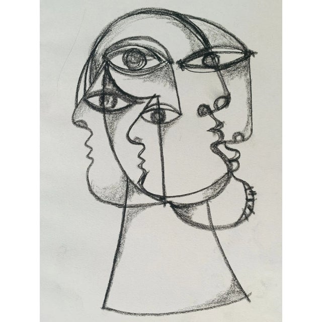 One of my favorite original 8" x 11" charcoal drawings torn right from the pages of my many sketchbooks. Signed and framed...