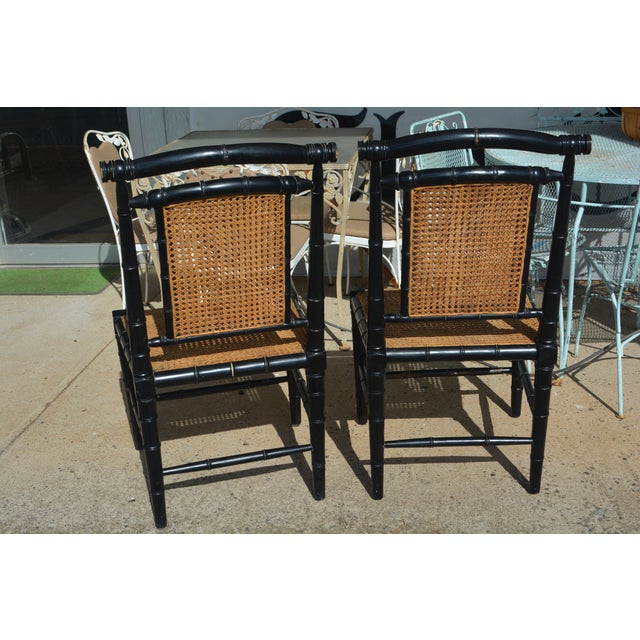 Great pair of bamboo & cane chairs. No makers mark, but I believe they are Colonial Noir. I did see Made in Indonesia on...