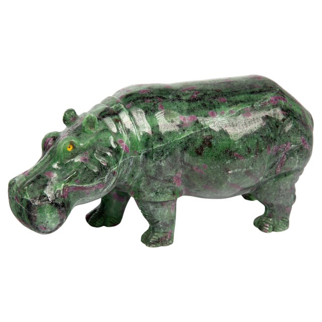 This stunning and unique decorative piece measures 8 inches in length. This exquisite hippo figurine is expertly crafted...