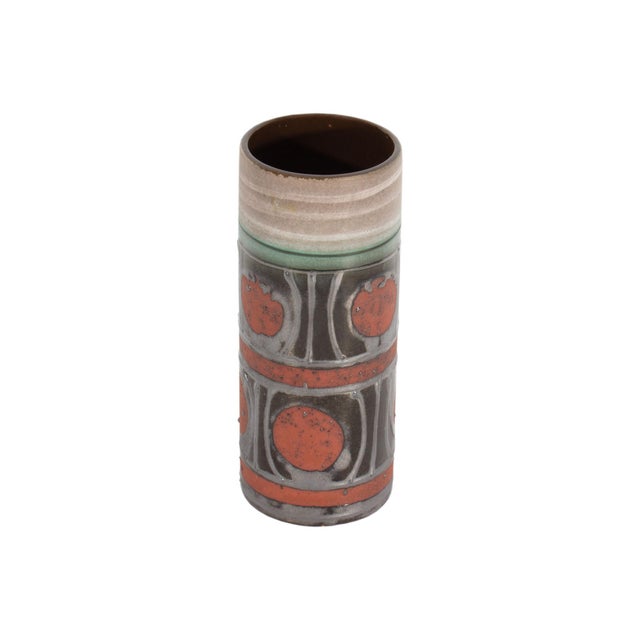 A West German ceramic vase produced by Carstens Tönnieshof. This mid-century vase is cylindrical in shape and features a...