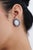 These target cluster stud earrings feature 14.24 carats of oval opals and blue sapphires, set in 18k white gold. The...