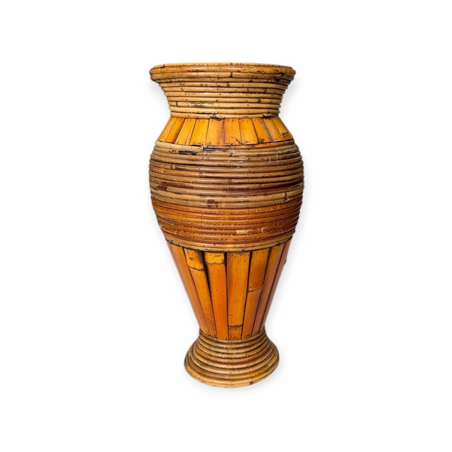 Vintage mid century pencil reed and bamboo tall vase. 9” diameter x 19” h. Mouth opening is 5.25”.
