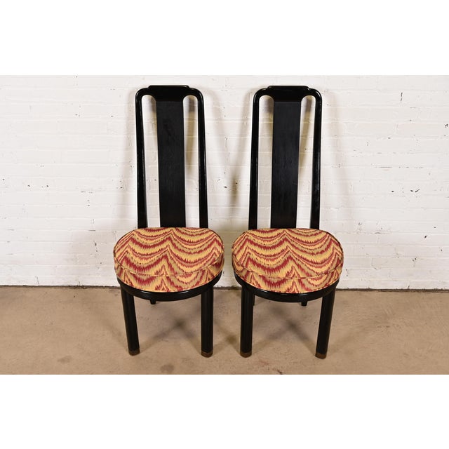 A gorgeous pair of mid-century modern Hollywood Regency Chinoiserie high back side chairs or dining chairs By Henredon...