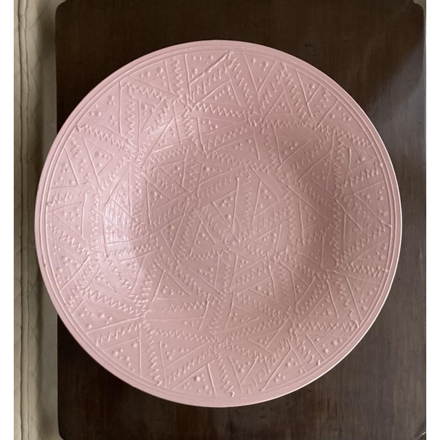 A large studio pottery bowl made by Roy Hamilton in the 1980s. The top has a pink on pink “Hadley” pattern while the...