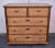 This splendid five drawer chest has a bold step-down edge to its thick top. The first tier comprises two short, deep...
