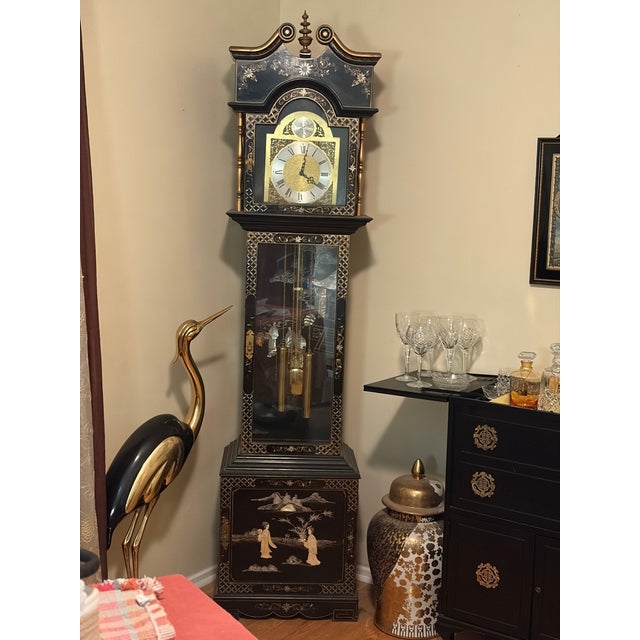 This asian clock black laquer and mother of pearl is beautiful..