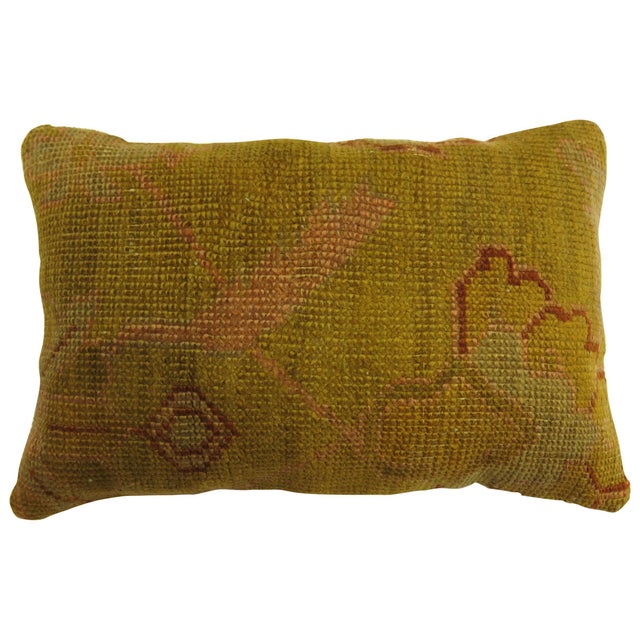 Pillow made from an antique Turkish Oushak rug with cotton back and zipper closure included.