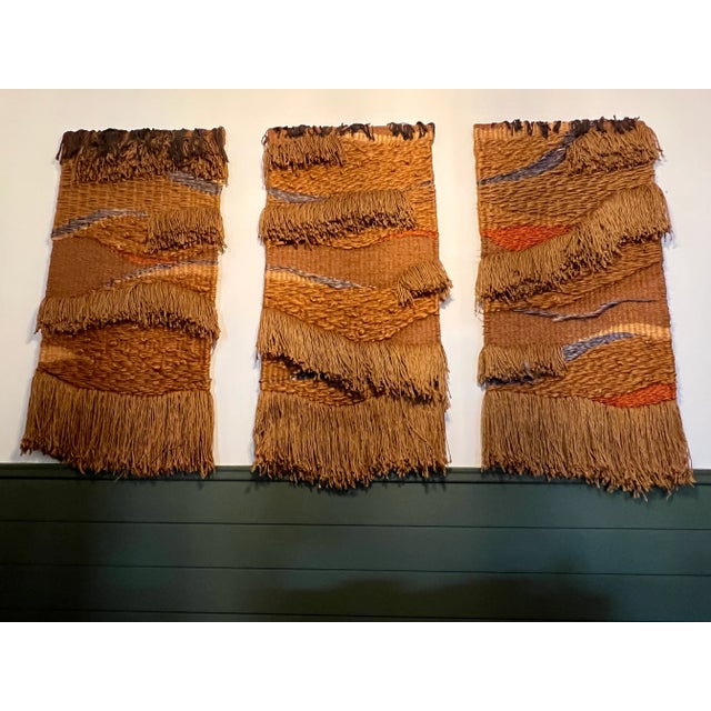 Dramatic Triptych fiber art "Flowing Landscape" by Winston Herbert. A mixture of natural fibers woven and knotted through...