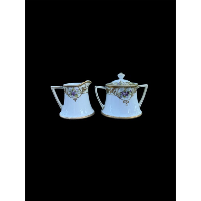 These were made in Japan by Toki Gomei Kaisha (pre Noritake) The company was established in 1904 in Noritake, Japan, by...
