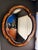 Tessellated polished horn and penshell scalloped wall mirror with brass trim in the manner of Maitland Smith. Can be hang...