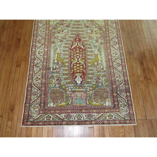 Interesting Turkish rug we purchased depicting different animal figures on a silver colored field. 4'4'' x 7' Sivas...