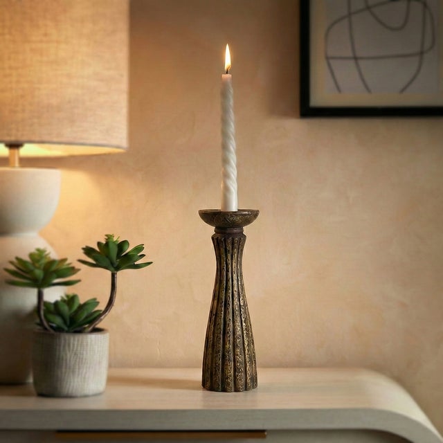 Dimensions: 5" W x 5" D x 14" H This is a vintage hand carved candle stand with hand embossed brass foil cladding. The...