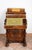 English Victorian Davenport in walnut burl with maple inlays from the first half of the 19th century. The front features a...