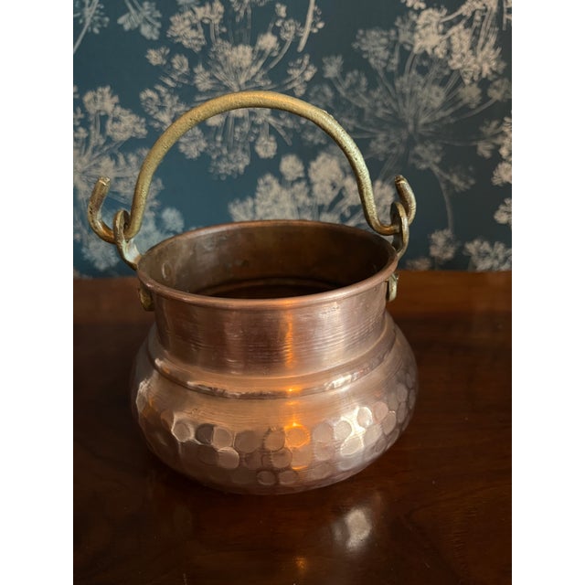 Ladies and gentlemen, welcome to the realm of the extraordinary! Behold our small hammered copper ritual cauldron, a...