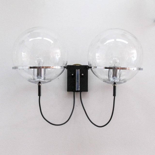 Wonderful double wall light by RAAK of Holland, 1960, with two 9" clear glass globes with bubble inclusions, wired for US...