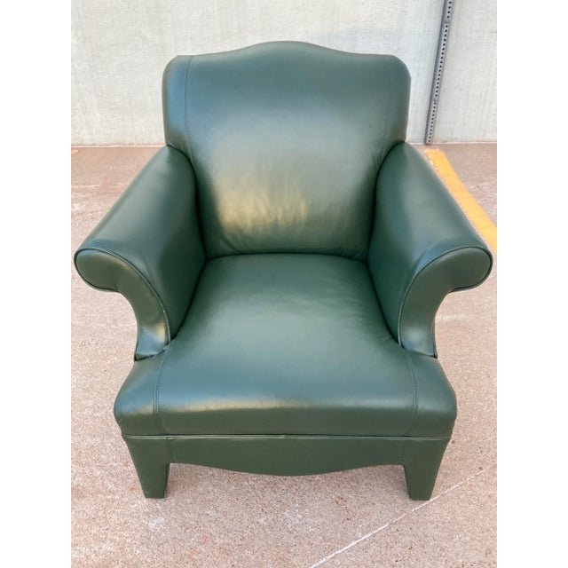 With similarities to Donghia’s Luciano chair, this fully upholstered neotraditional armchair has many of the...
