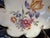 A Jimenau Graf von Henneberg German porcelain bowl. The piece has hand painted flowers in the center and a genuine cobalt...