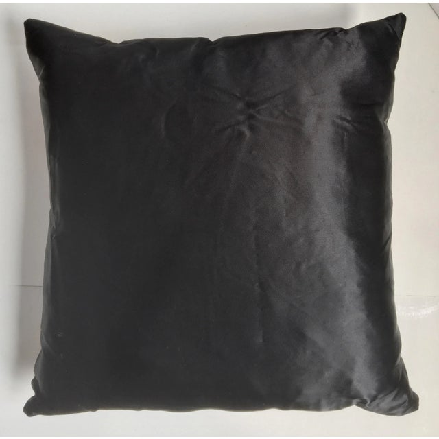 This down-filled pillow is made from a patchwork of antique tobacco promotional silks with Varsity logos and crests. It is...