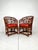 Vintage pair of 70's Chinese chippendale Brighton style rattan chairs. Horse shoe back rattan arm chairs with removable...