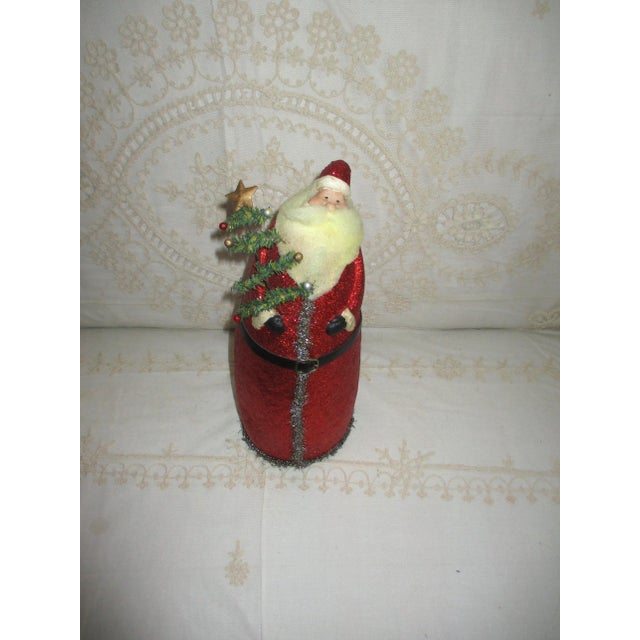This is a Darling! Vintage Whimsical Christmas Red Glitter Santa Claus With Tree that is 13" tall x 5" wide and deep and...