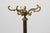 An elegant French coat stand from the early 20th century, crafted in the Napoleon III / Belle Époque style. The piece...