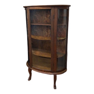 Antique Curved Glass Curio Cabinet With Original Finish For Sale