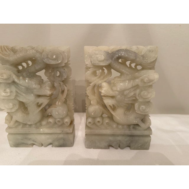 Pair of Carved Onyx Dragon Bookends – Asian-Inspired Elegance Add a touch of mystique and refinement to your shelves with...