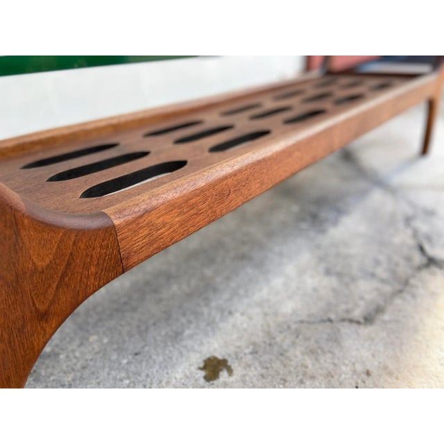 Rare Slotted Coffee Table with Surfboard Glass Top in the Style of Harvey Probber. Beautifully carved wood detail at...