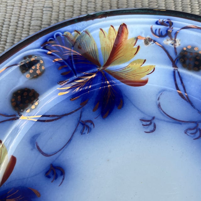 A Very Nice Antique Staffordshire Gaudy Ironstone Flow Blue Plate, Circa 1850's Marked on the back with the English...