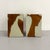 A sculptural pair of vintage pedestal tables featuring richly figured burl wood veneer contrasted with glossy lacquered...