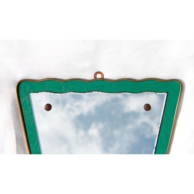 Ottavia is a timeless piece of Italian craftsmanship from the early 1950s. This mid-century mirror is entirely hand-...