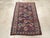 This early 20th century Caucasian Kuba rug, measuring 3' 5" x 5' 6", features a bold and dynamic composition emblematic of...