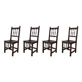 Early 20th Set of Four Spanish Carved Chairs with Wood Seat For Sale