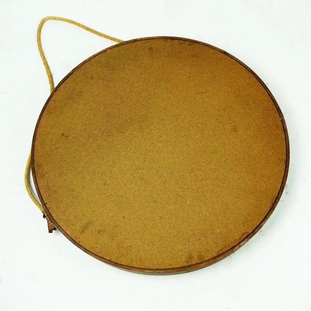 Excellent handcrafted Italian 1950s wall mirror with leather strap. This excellent handcrafted circular vintage mid...