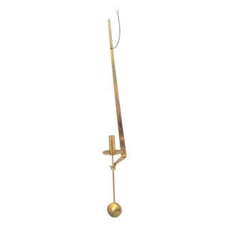 Wall Candleholder in Brass with Pendulum Suspension by Pierre Forsell for Skultuna, 1960s For Sale