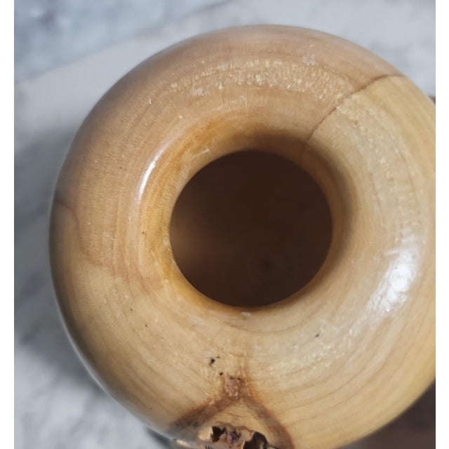 Handmade turned burlwood bud vase. High gloss finish and no glass insert. Unsigned.